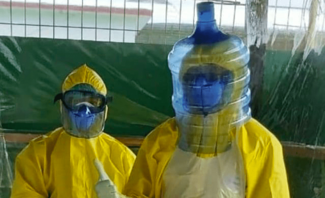 KREATIF: Seorang tenaga medis membuat APD dari galon untuk meningkatkan rasa aman saat menangani pasien korona. (Foto: Istimewa)