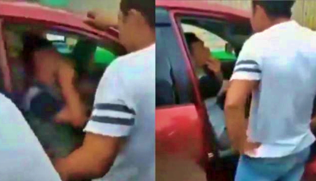 Sang suami saat memergoki sang istri selingkuh dalam mobil dengan pria lain