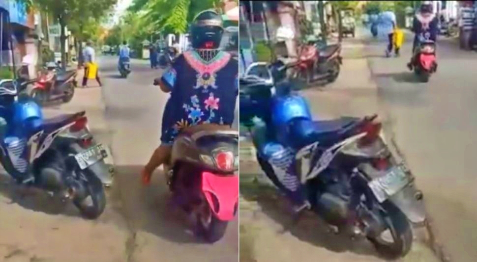 tangkapan layar video emak-emak tutup plat nomor dengan CD dan BH