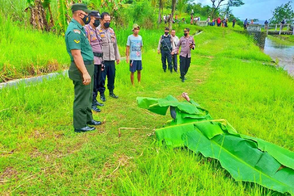 penemuan mayat dengan sejumlah luka-luka di saluran irigasi Kalibawang