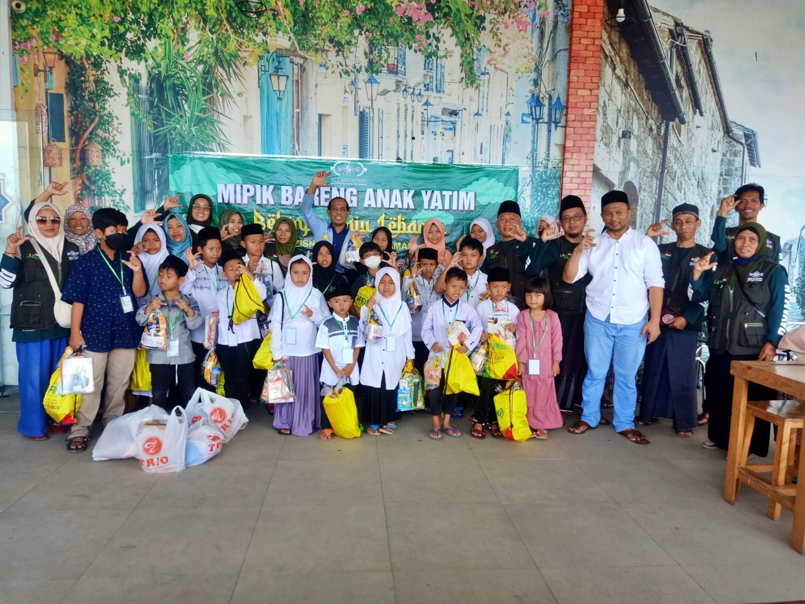 LAZISNU Ranting Payaman Secang Magelang progam mipik baju lebaran bersama anak yatim