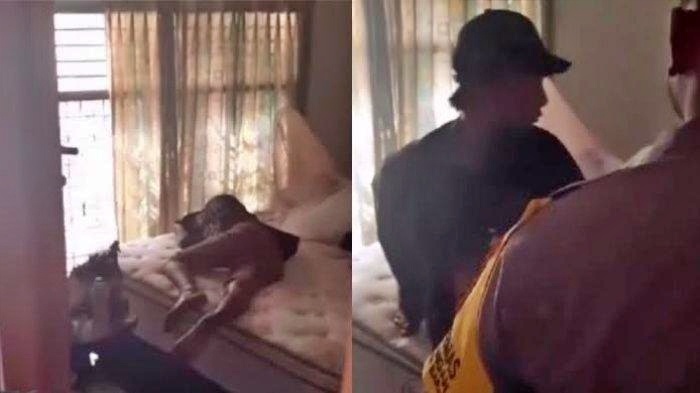 tangkapan layar video seorang pencui tertidur di rumah yang dibobolnya