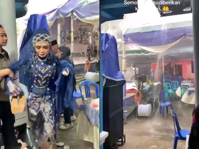 tangkapan layar video Pernikahan viral diterjang hujan deras dan angin kencang. Dekorasi rusak, area resepsi banjir, pengantin wanita dievakuasi